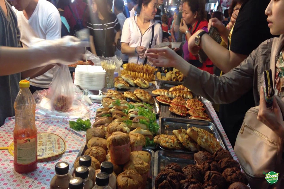 Enjoying The Foods When Walking On Hanoi Old Quarter Streets - Hanoi Local Food Tours